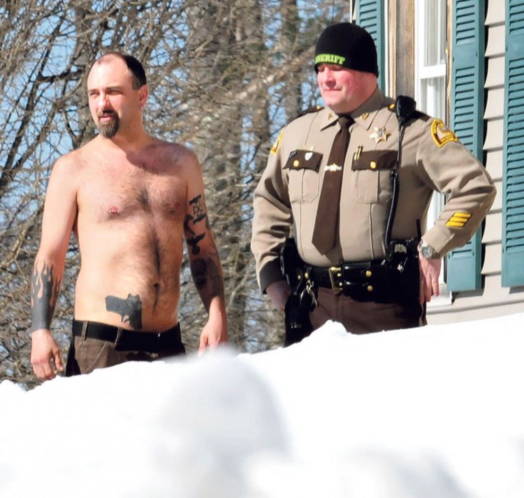 Maine man's 'gun' turns out to be a tattoo  1