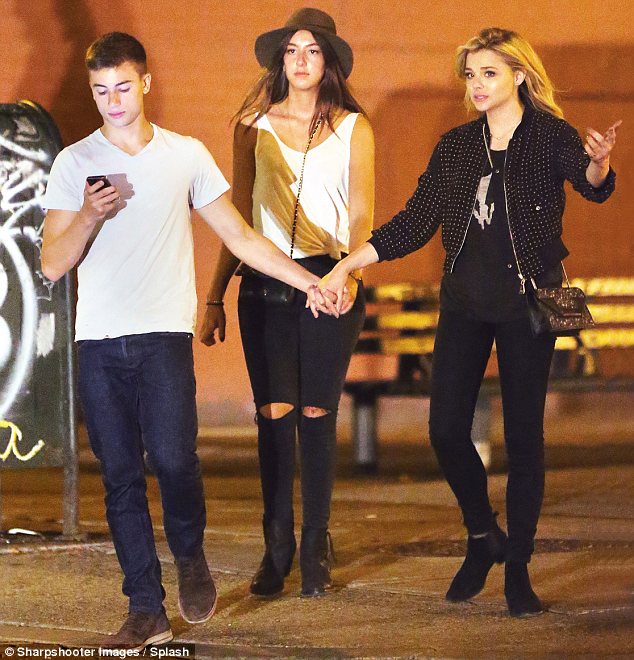Brooklyn Beckham's girlfriend Chloe Moretz holds hands with Julian Moraes in New York 6