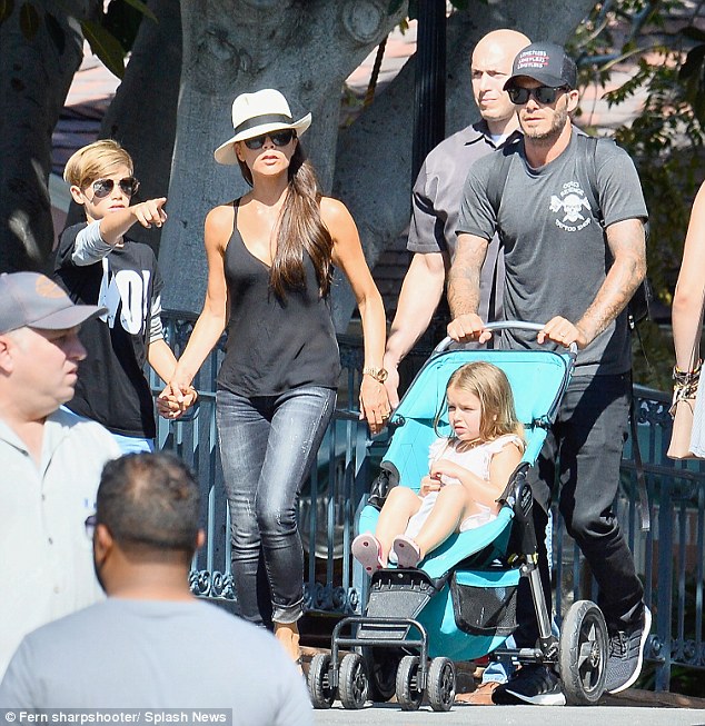 A princess in her element! Harper looks thrilled as David and Victoria Beckham take her and brothers Brooklyn, Romeo and Cruz to Disneyland 2