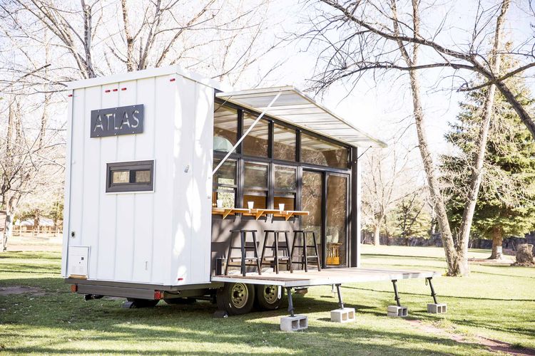 Modest 192-Square-Foot Eco Tiny Home Hides Open Deck And Glass Wall 7