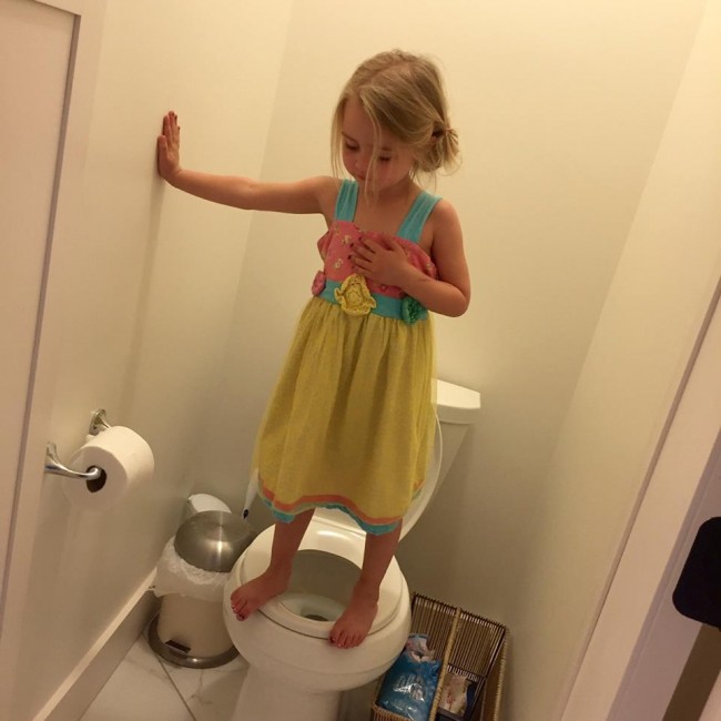 little-girl-standing-toilet 3